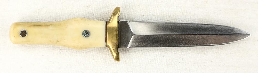 Ka-Bar 2750 Dagger / Boot Knife: Stainless steel blade Made in Japan. Nylon handle. Overall very good condition. Good factory edge and tip. No sheath. Blade measures 5", overall measures 9". See photos.