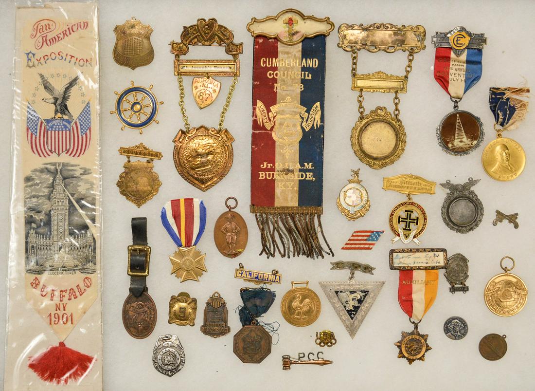 Lot of US Medals, Pins and Ribbons: Lot of medals, pins and ribbons mostly from the US with a few from other countries like Cuba. Medals are for various events and lodges from the early to mid 20th century. Includes 31 medals, pins and 