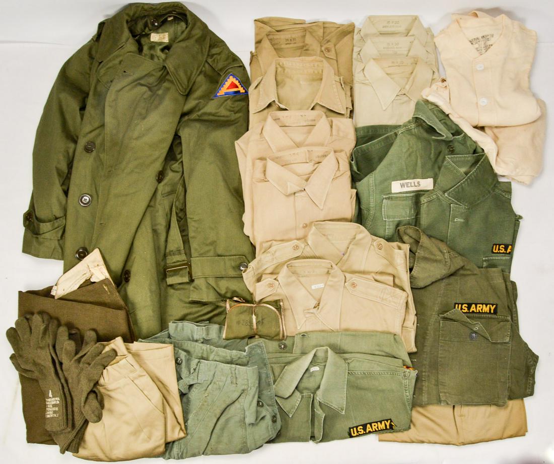 Korean/Vietnam War US Uniform Grouping: Grouping of US uniform clothing items from the Korean and Vietnam War. Lot includes a set of medium long underwear with shirt, short small overcoat, 2 pairs of wool gloves, US collar insignias, belt b
