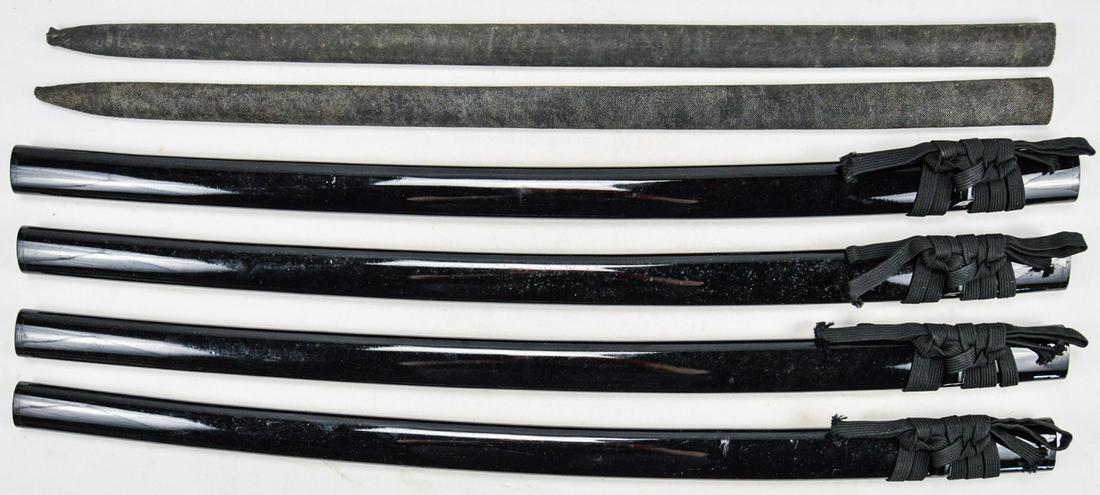 Lot of 6 Japanese Sword Scabbards: Lot of 6 modern Japanese sword scabbards, 4 black lacquered and 2 ray skinned. Scabbards measure 30.5" long for the lacquered and 29.5" for the ray skinned. All scabbards are in very good condition wi