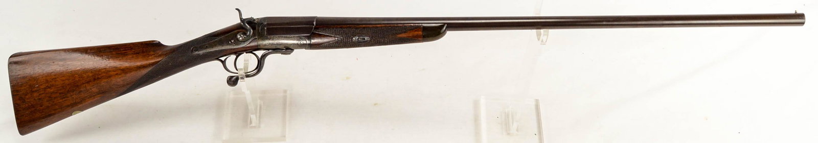 Ward & Son 16 Gauge Single Shot Shotgun: Side/under lever action. Damascus barrel. Single exposed rabbit ear hammer. Neat older single shotgun with very intricate action. Receiver is lightly engraved. Wood and metal in good condition for age