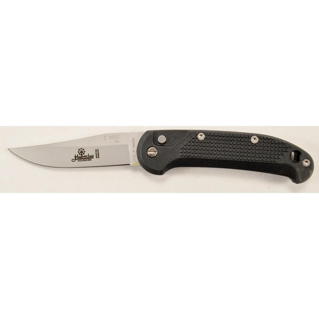 Hubertus 8.5" Coil Spring Switchblade: Hubertus 8.5" Coil Spring Side Opening Automatic Switchblade. 8.5" Overall length. 3 3/4" blade. "Hubertus Solingen Rostfrei Germany" etched on blade. "Steel of Sweden" tang stamp. "Z 2000 558" stampe