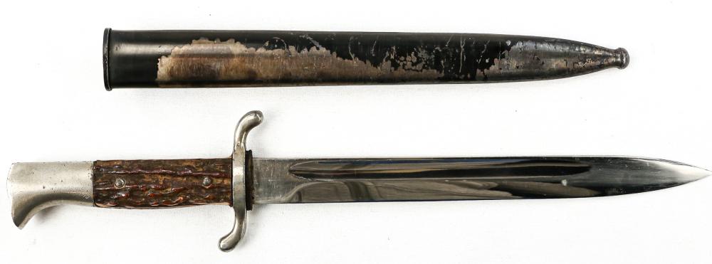 WWII German Fireman's Bayonet: Fireman's bayonet with stag grips. Not maker marked. Nice original condition. Bright blade has factory edge, no edge chips, good tip. Steel scabbard in good condition, no dents. Retains approx 50% of 
