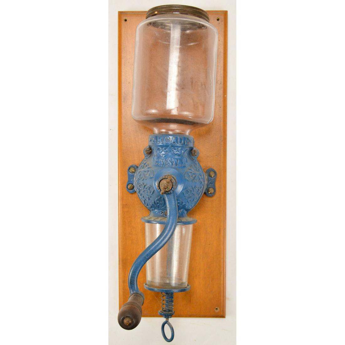 Arcade Crystal No. 3 Wall Coffee Grinder: A wall mounted coffee grinder made by Arcade in the late 1800â€™s. Grinder comes with the original hopper and catch. Neither catch nor hopper have any cracks or chips. Hopper reads â€œCrystal