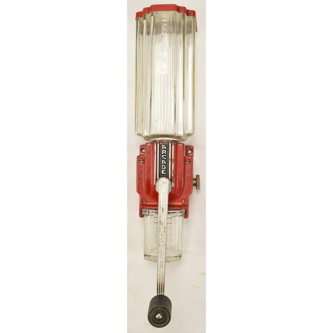 Arcade Art Deco Wall Coffee Grinder: Arcade Art Deco wall coffee grinder model 9010 made in the 1920â€™s. Grinder comes in a red coloring with 95% of the original coloring. Handle has some wear but can turn and grind easily. Glass h