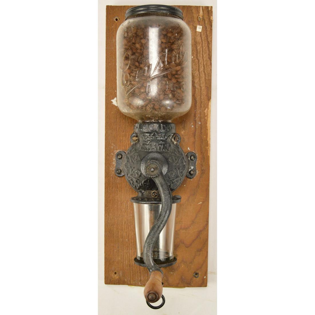 Arcade Crystal No. 3 Wall Coffee Grinder: A wall mounted coffee grinder made by Arcade in the late 1800â€™s. Grinder comes with the original hopper and catch. Neither catch nor hopper have any cracks or chips. Hopper reads â€œCrystal