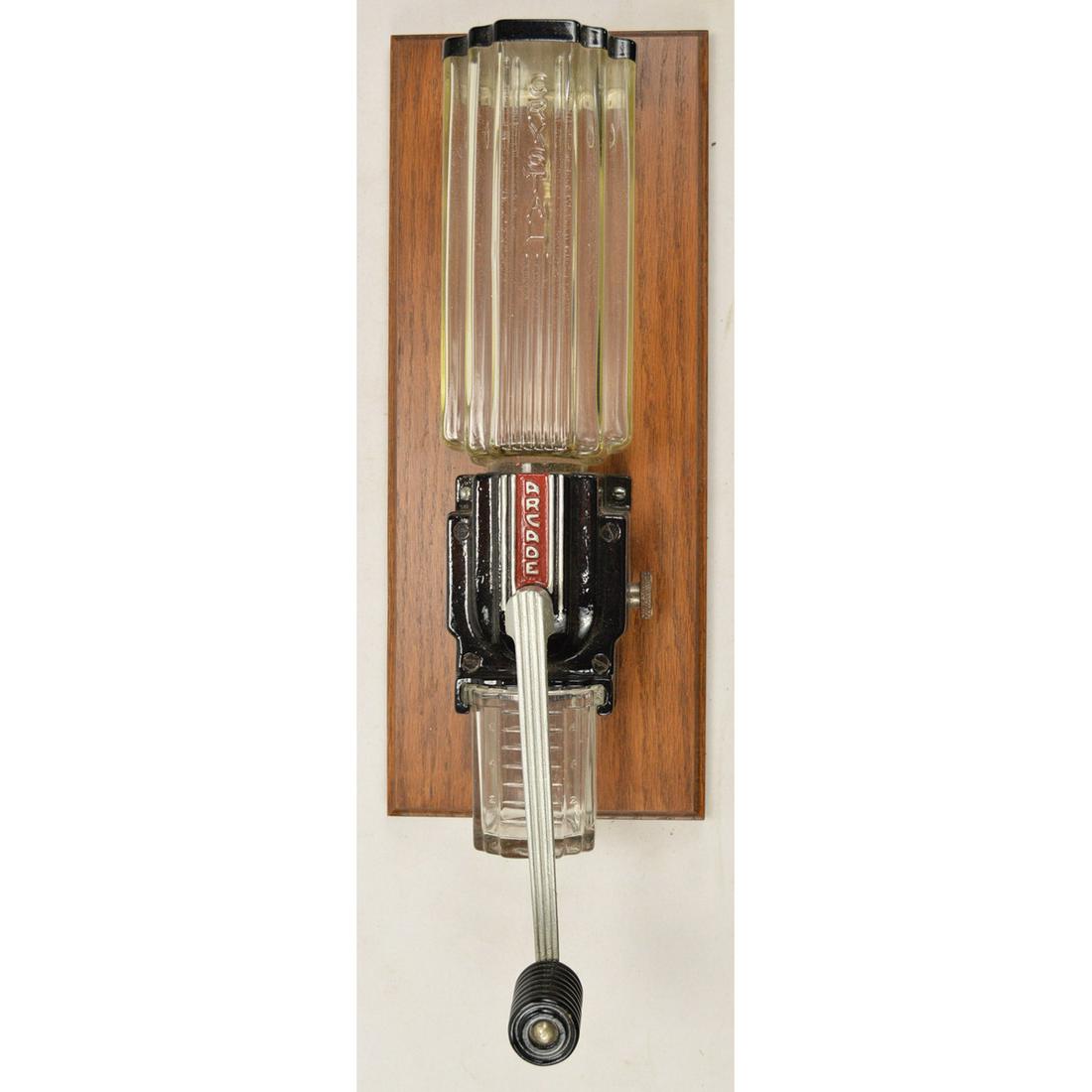 Arcade Art Deco Wall Coffee Grinder: Arcade Art Deco wall coffee grinder model 9010 made in the 1920â€™s. Grinder comes in a black coloring with 99% of the original coloring. There are few areas without the paint on the grinder. Han