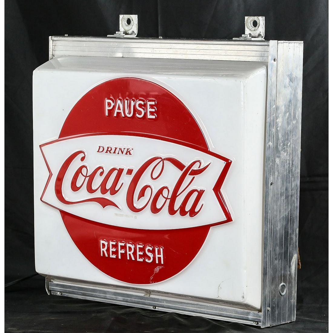 Coca-Cola Light Up Sign: Coca-Cola Light Up Sign, Says Pause, Drink, Refresh, aluminum can, lights up and works, has 1 fracture on bottom right corner of plastic. 24" x 24"