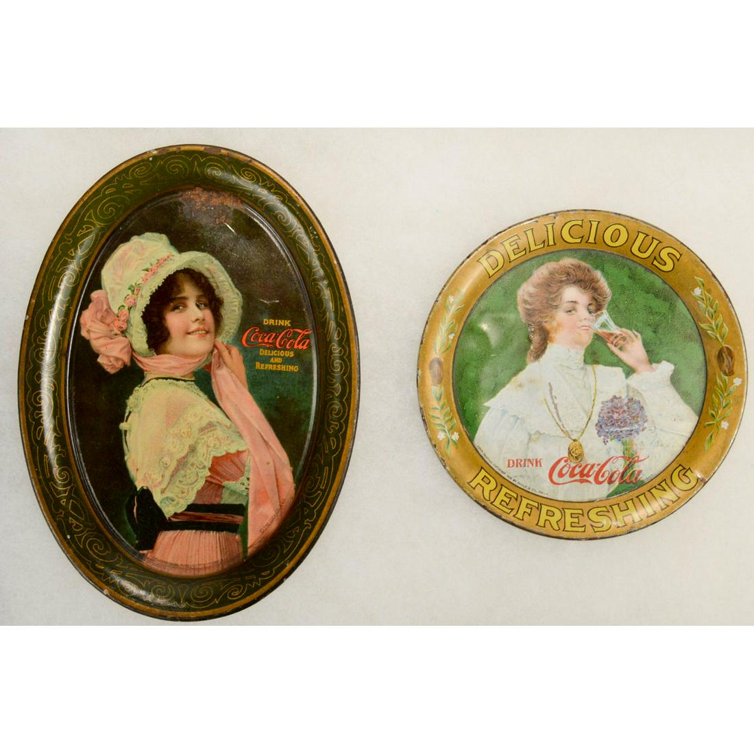 Lot of 2 Very Early Coca-Cola Tin Tip Trays: Lot of 2 Very Early Coca-Cola Tin Tip Trays, Lot of 2 trays, first a 1914 Betty tip tray in very good condition with a few very minor edge chips, second a rare early round tip tray depicting the cocoa