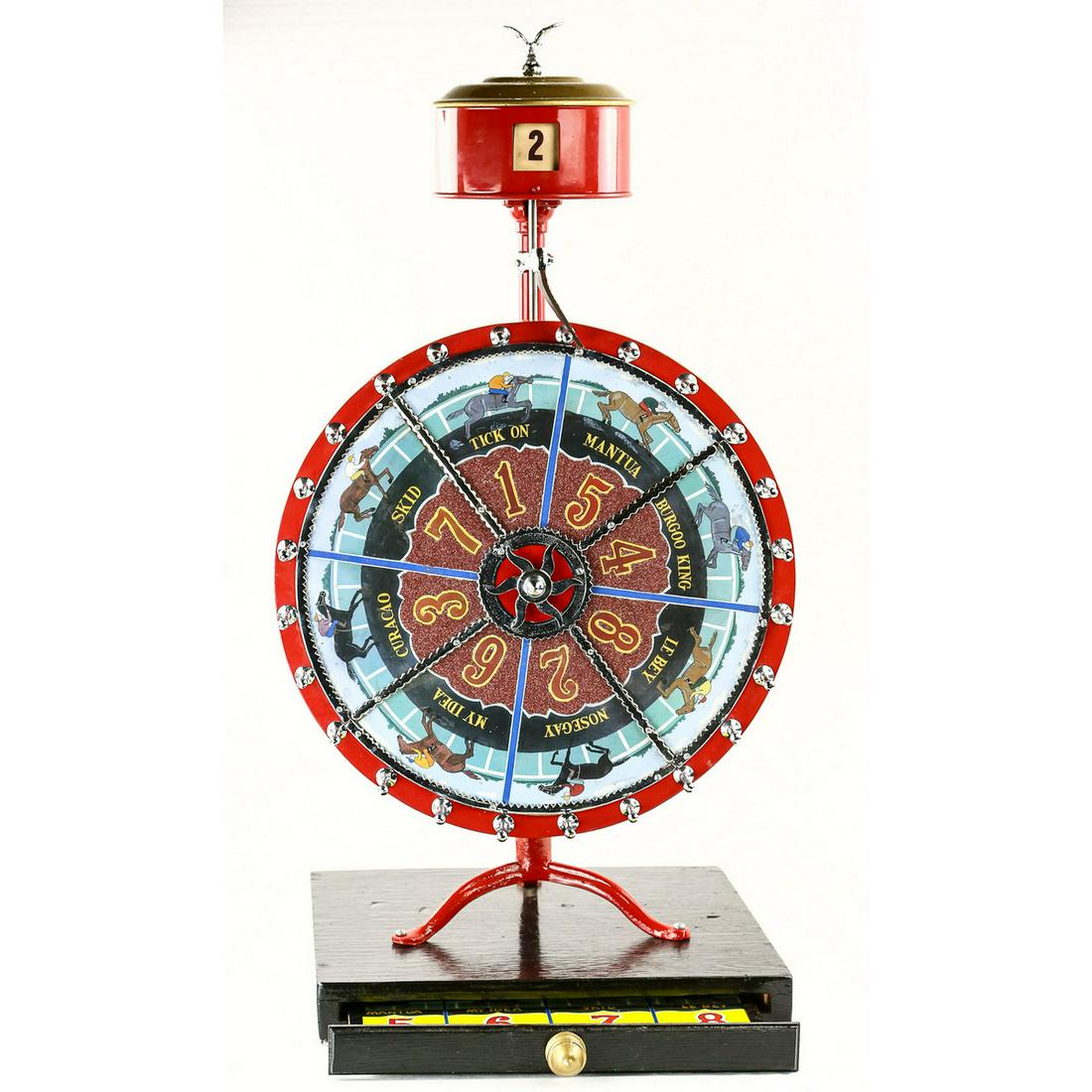 Countertop Horse Racing Gambling Wheel: Restored small counter top odds changing gambling wheel. Wheel depicts race horses mounted on a wood cabinet housing odds chart. Overall very good condition, measures 20 1/2" x 20" x 39"