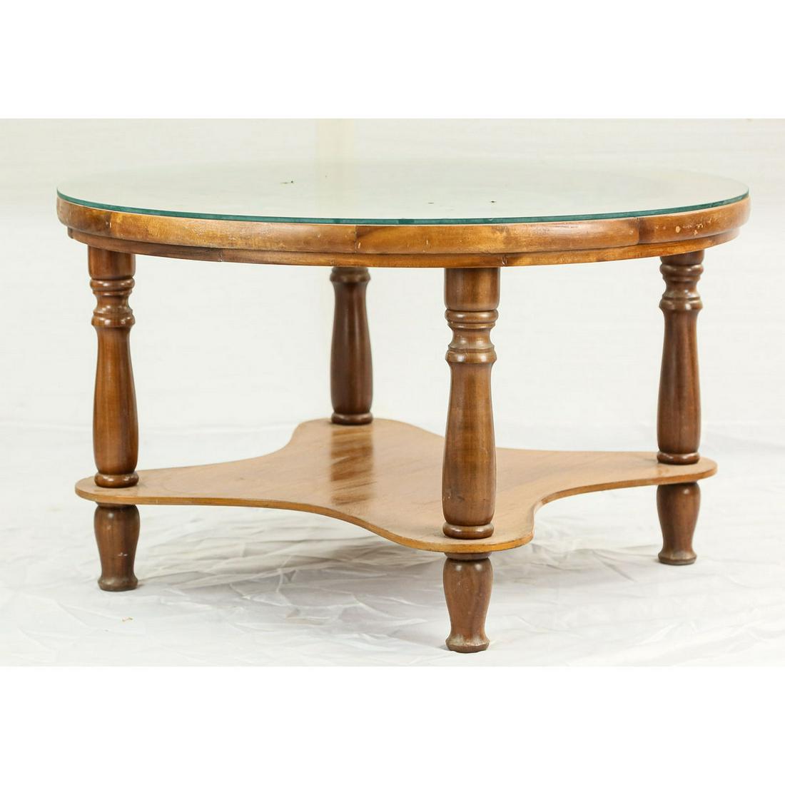 Round Wooden Table Glass Top Brass Compass Rose: Round Wooden Table Glass Top Brass Compass Rose. Wood in in good lightly used shape. Glass top is in good shape. Brass compass rose is dull patina. Measures 28.5" diameter x 16.5" tall. See photos.