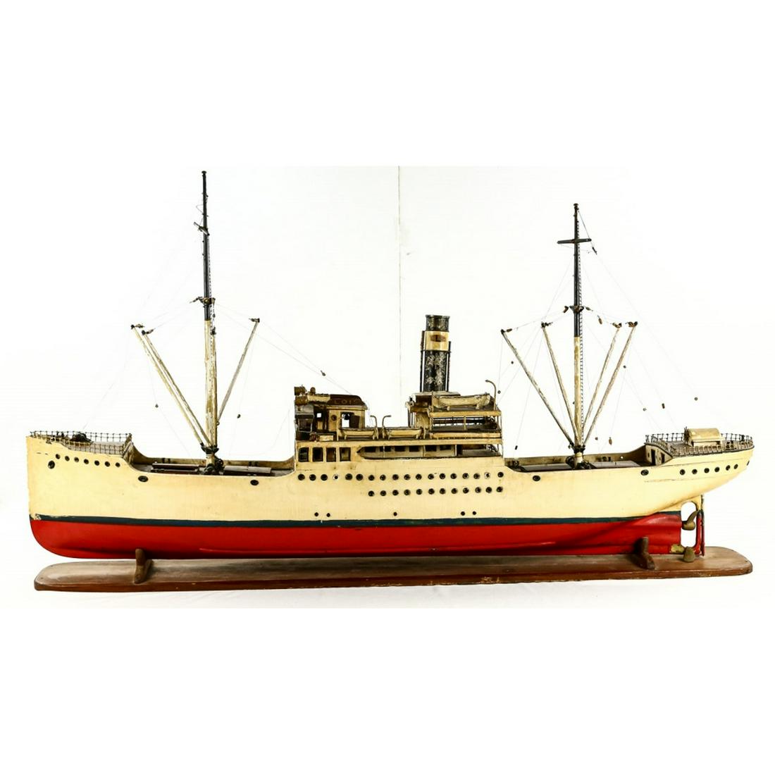 Vintage Large Wood Model of a Steam Ship: A highly detailed folk art model of a large, single stack steam ship. This ship is named â€œLois” and looks to be circa 1910-1925. Has some paint crazing and a few small details are gone and