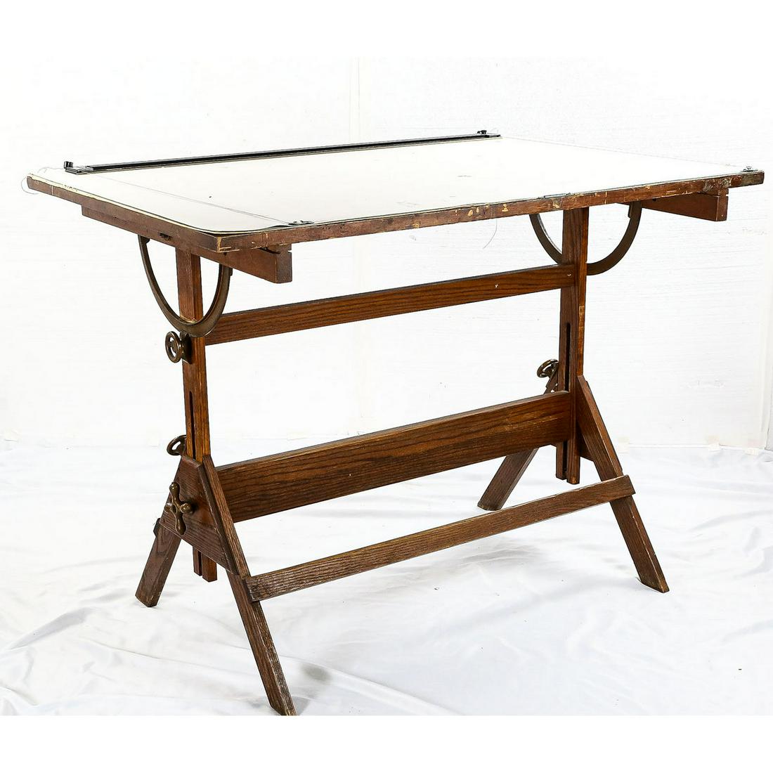 Vintage Oak Hamilton Adjustable Drafting Table: Vintage Oak Hamilton Adjustable Drafting Table, A vintage draft mans table adjustable in height and pitch, manufactured by The Hamilton Co, has all the original hardware which looks to be solid brass,
