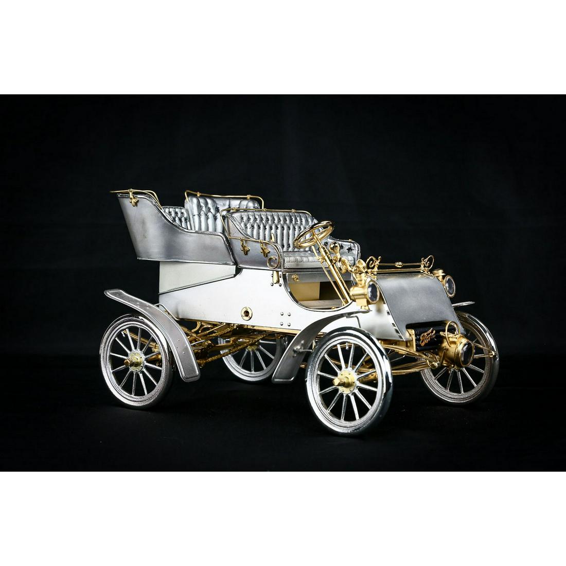 Rare Sterling Silver & Gold 1903 1/8 Model A Ford: Rare 75th Anniversary Sterling Silver & Gold 1903 Model A 1/8 Scale Ford. No# 471 of 1700, 75th anniversary sterling silver and gold 1903 model A ford. Made by the American Silversmiths guild, 1977. I