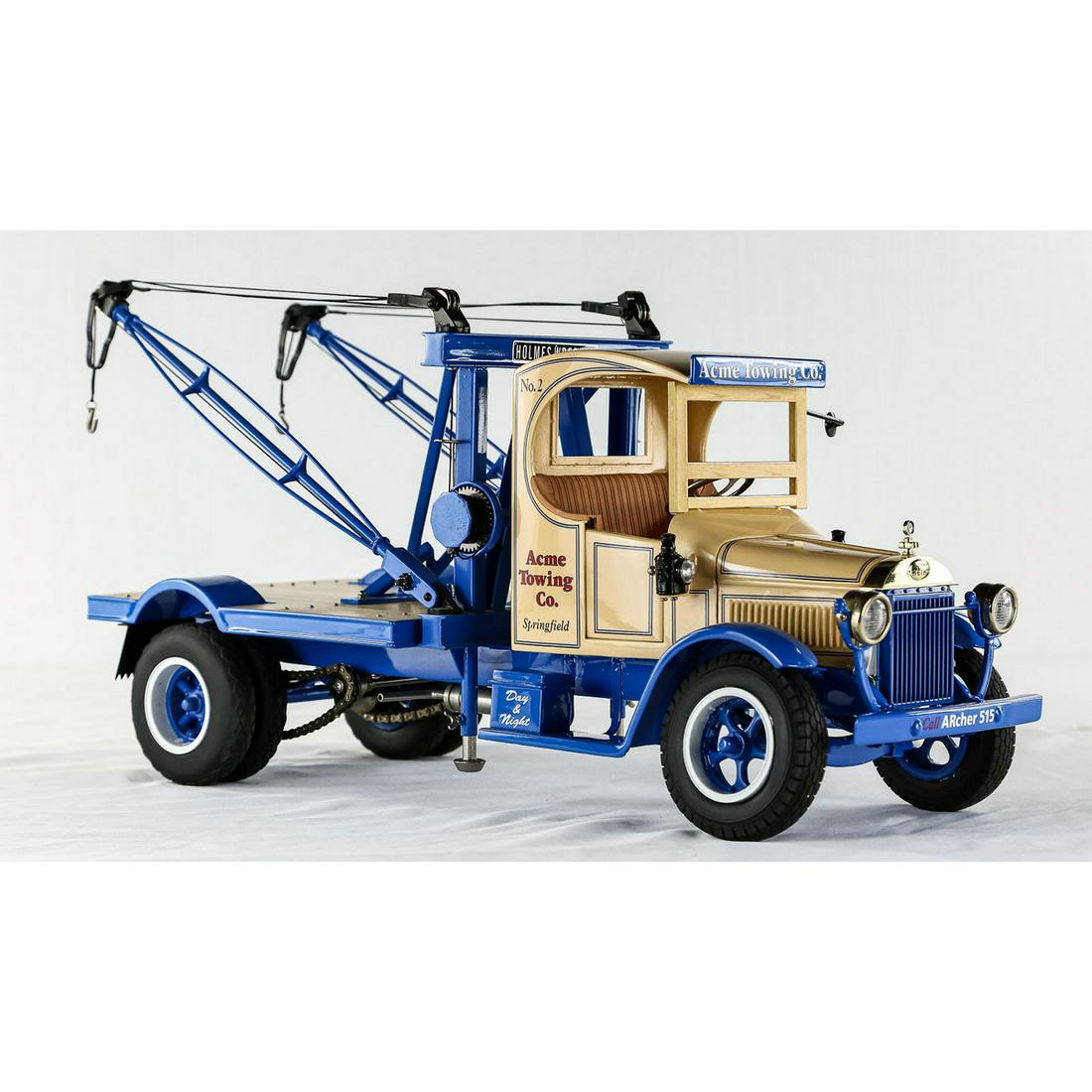 AB Mack Acme Double Boom Holmes Wrecker Model: Vintage all-metal C-Cab chain driven double boom tow truck. Manufactured by Retro 1-2-3. Limited edition of 275 pieces. Features include sliding pocket doors, working booms and working outriggers. 1:8