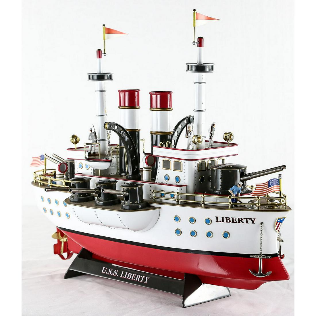 WWI USS Liberty Battleship Custom-Made Model: Pressed steel creation manufactured by Retro 1-2-3 in the spirit of the WWI battleship models created by Marklin. Model features triple gun batteries both port and starboard, wind-up clockwork mechani