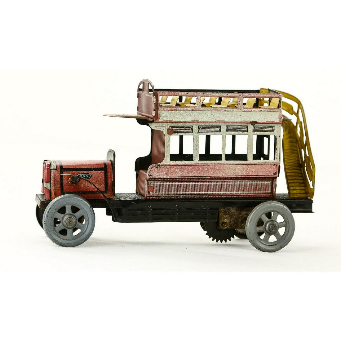 German Auto Bus Tin Wind Up Toy: Mechanism does work. Very good condition. Measures 7" x 4.25".