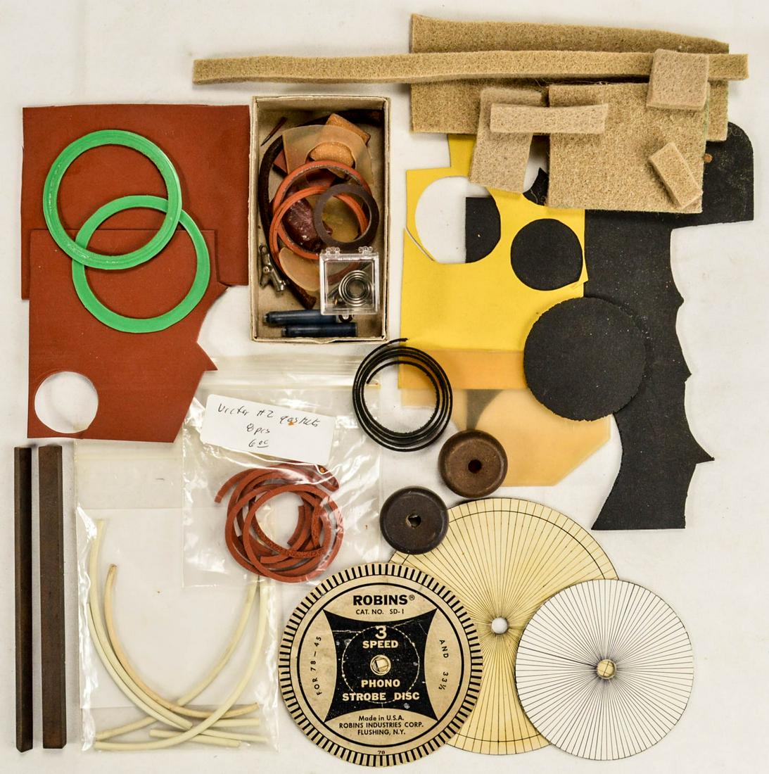 Box Lot Antique Phonograph Reproducer Parts: Box lot of gaskets, needles, screws, rubber trim, felt pads, etc. Please see photos. Lots of good stuff
