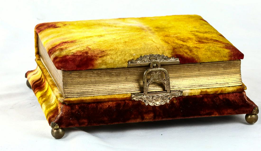 Vintage Velvet Victorian Musical Photo Album: Victorian era musical photograph album made in Switzerland. Music box winds from the bottom and plays 2 different tunes when the album latch is released. Album is full of period photographs and all ar