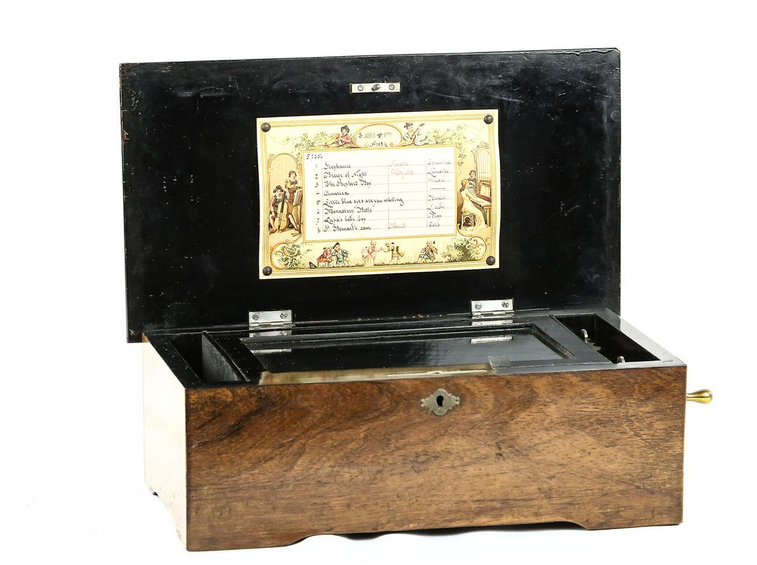 Cylinder Music Box - 8 Tune: Vintage music box circa late 19th century probably Swiss or German mfg. Mechanism winds and plays beautifully. No chipped or broken teeth in comb. Plays 8 different tunes. Wood case in VG original fin
