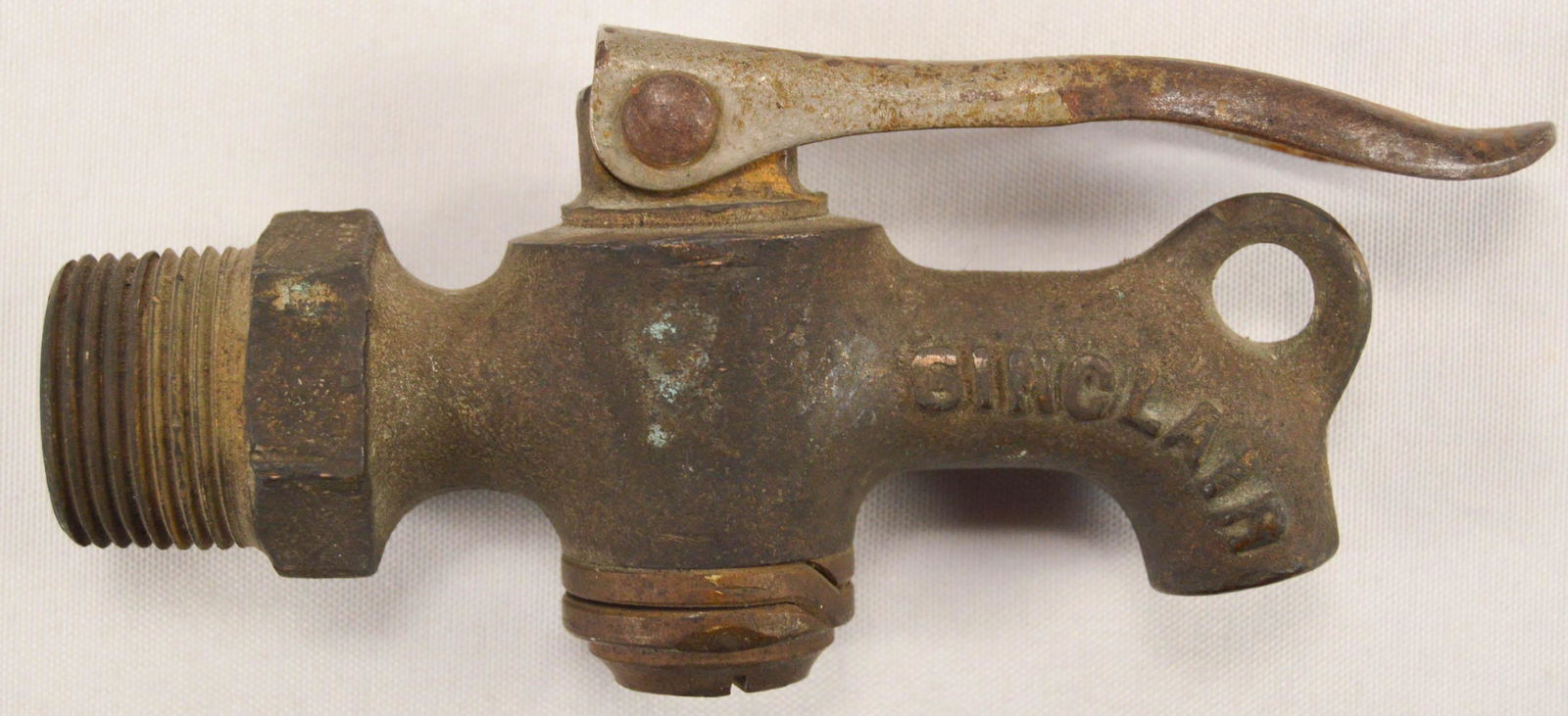 Sinclair Embossed Brass Oil Drum Spigot: Automobilia Sinclair Embossed Brass Oil Drum Spigot, Small embossed brass oil drum spigot with locking on/off lever, manufactured for the Sinclair Oil Company, not tested, good condition. 2.25" x 5"