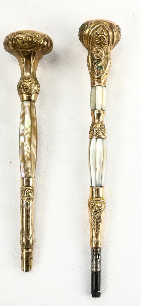 Pair of Mother of Pearl Parasol Handles: Pair of Mother of Pearl Parasol Handles, gold-filled, one engraved with "To Mrs. Williams, Anna May and Mabel" on end, 9" and one monogrammed with "H E M", 8 3/4", overall very good condition,.