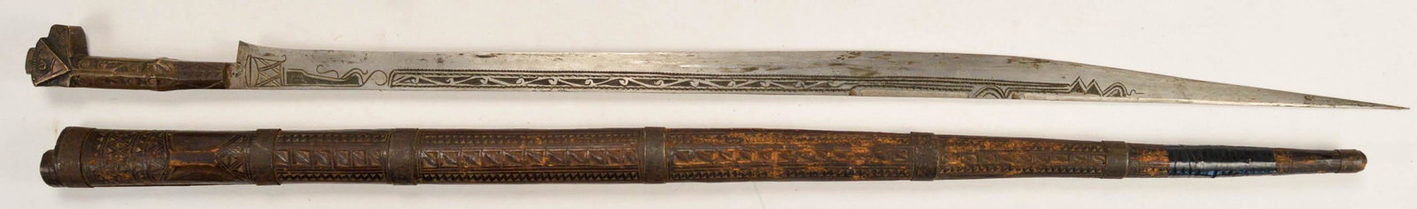Tribal Sword with Carved Wood Sheath: Tribal Sword with Carve Wood Sheath. 36" Long. Good condition