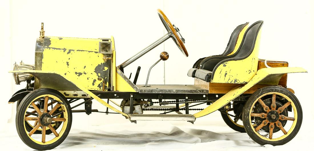 Vintage Carnival Tin Lizzie: Vintage Carnival, Shriners Go Cart, Tin Lizzie. Age and maker unknown. Vintage motor powered (motor missing) Model T type twin seat parade car. The mini vehicle has a lot of high end amenities such as