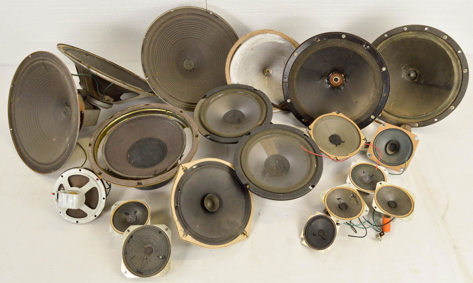 Lot of Various Speakers and Parts: Lot of Various Speakers and Parts. Includes 10" Philco Speaker. 3 qty 12" Philco speaker. 2 qty 8" Realistic speaker. 1 qty 8" Capehart speaker. 1 qty 10" speaker no mfg. 1 qty 9" speaker no mf. 1 qty