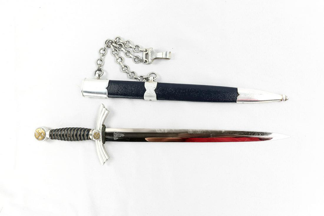 1st Pattern Luftwaffe Dagger Second Type: 1st Pattern Luftwaffe Dagger Second Type. Has aluminum fittings, and maker marked with "E. Pack & SHONE" logo. A collection quality dagger, has perfect leather. Has chain hangar on scabbard.