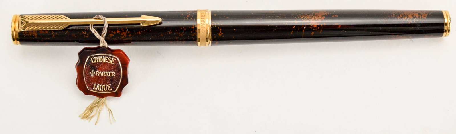 Parker French Chinese Lacquer 75 Roller Ball: French Parker Chinese Lacquer 75 RB. Comes with medallion. Overall excellent NOS condition. Measures 5.25"