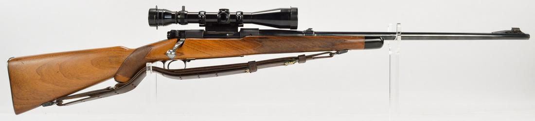 Pre64 Winchester Model 70 Super Grade .30-06 Rifle: A Winchester Model 70 chambered in .30-06 and made in 1951. Rifle has Griffin & Howe side rail scope mount and Redfield 3x-9x scope. Scope optics are clear. Rifle has iron sights mounted on 24" barrel