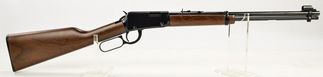 Henry Lever Action.22LR: LNIB. Minor scratch on receiver. Some minor dings and scratches in the wood. Comes with original box and instructions. See photos. SN: 516378H