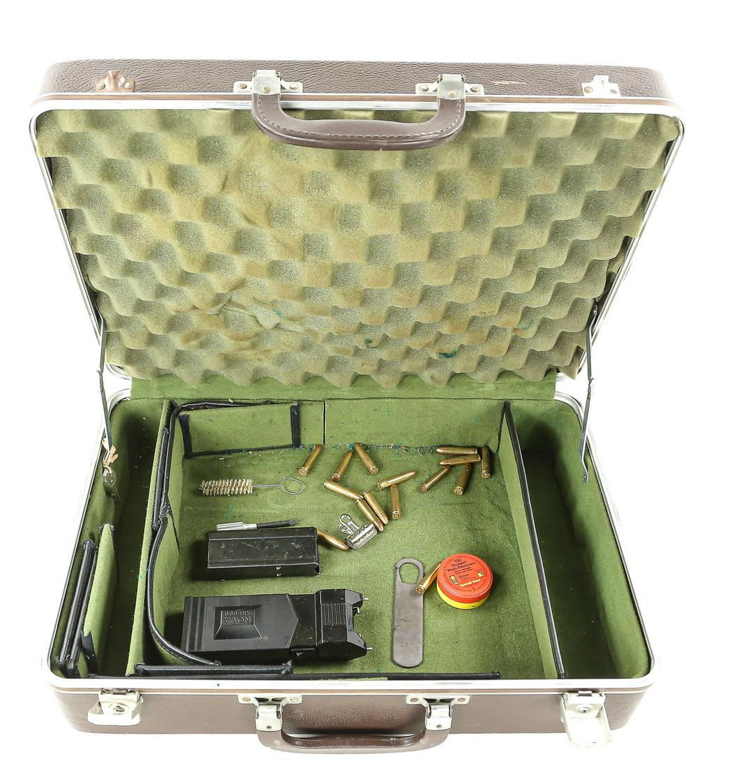 Gun Case, Taser, & 30 Carbine Ammo: Lot of a gun case that has a taser and a mag full of 15 rounds of 30 Carbine. Also comes with some other gun cleaning parts. Good used condition. Case comes with keys.