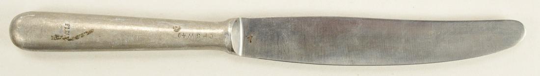 WWII German Luftwaffe Mess Hall Knife: A mess hall knife for the Luftwaffe during WWII. Knife has Luftwaffe eagle on the handle tip and is marked "Garantie Rostfrei" on the blade. Handle is marked "CPSW40" and "F1.U.V". Knife is in good us