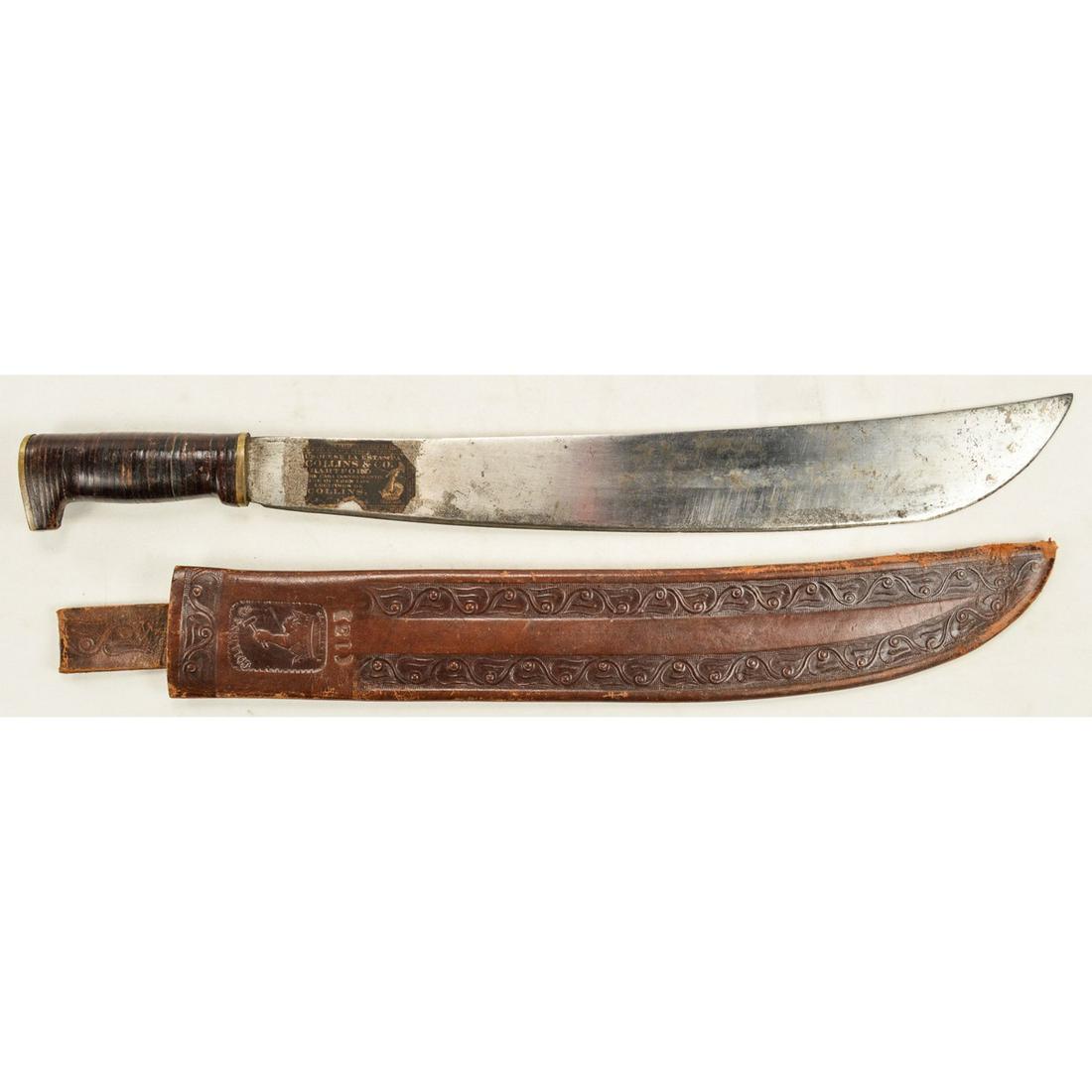 WWII US Collins & Co No. 12 Machete w/ Scabbard: A WWII Collins & Co machete marked No. 12 on the blade and in a number 15 scabbard. Blade has a majority of the original sticker but some has been worn away. Other side has the factory engraving sayin