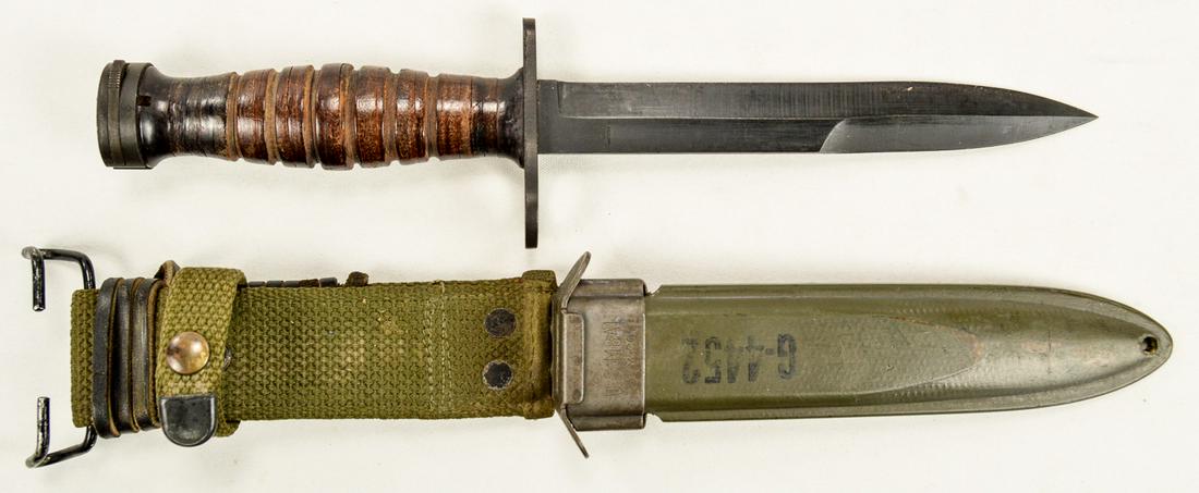 WWII US M-4 M1 Carbine Bayonet: Has Vets ID scratched into/onto back of sheath "G4452". Blade is in very good condition with the edge and point still sharp. Handle has some wear from use but springs and lock still work.