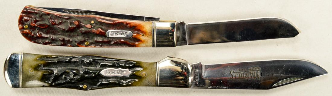 Marbles Knives with case (2): Lot of 2 Marbles folding knives with cases and in their original box. Knives are like new with imitation stag horn handles. Like new.