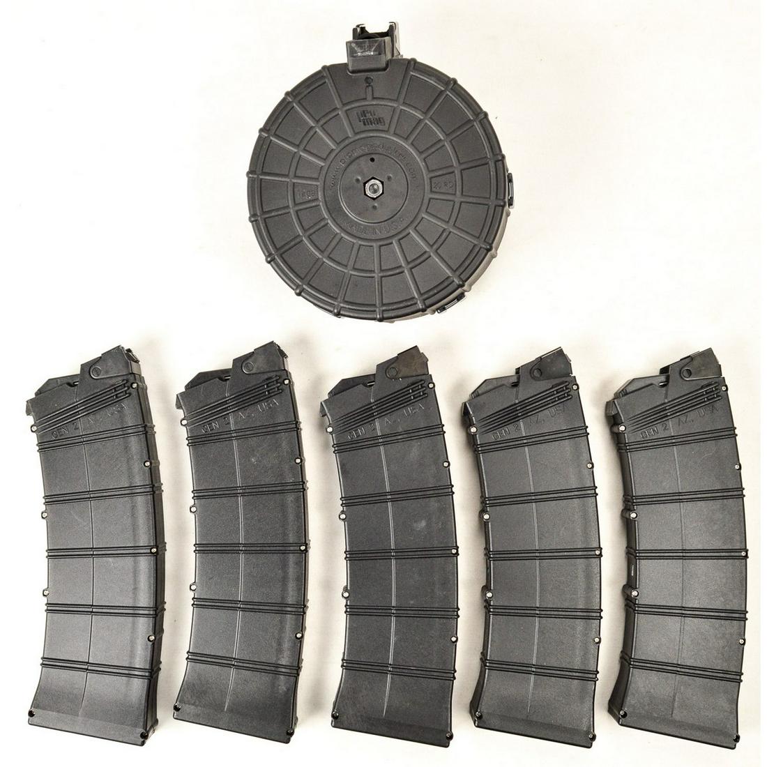 Lot of 6 Saiga 12 Magazines: Lot contains 5 10 round Gen 2 magazines by AGP Arms Inc and a 20 round drum magazine by Promag. All magazines are in very good to excellent condition. A must have for any Saiga 12 owner. See photos.