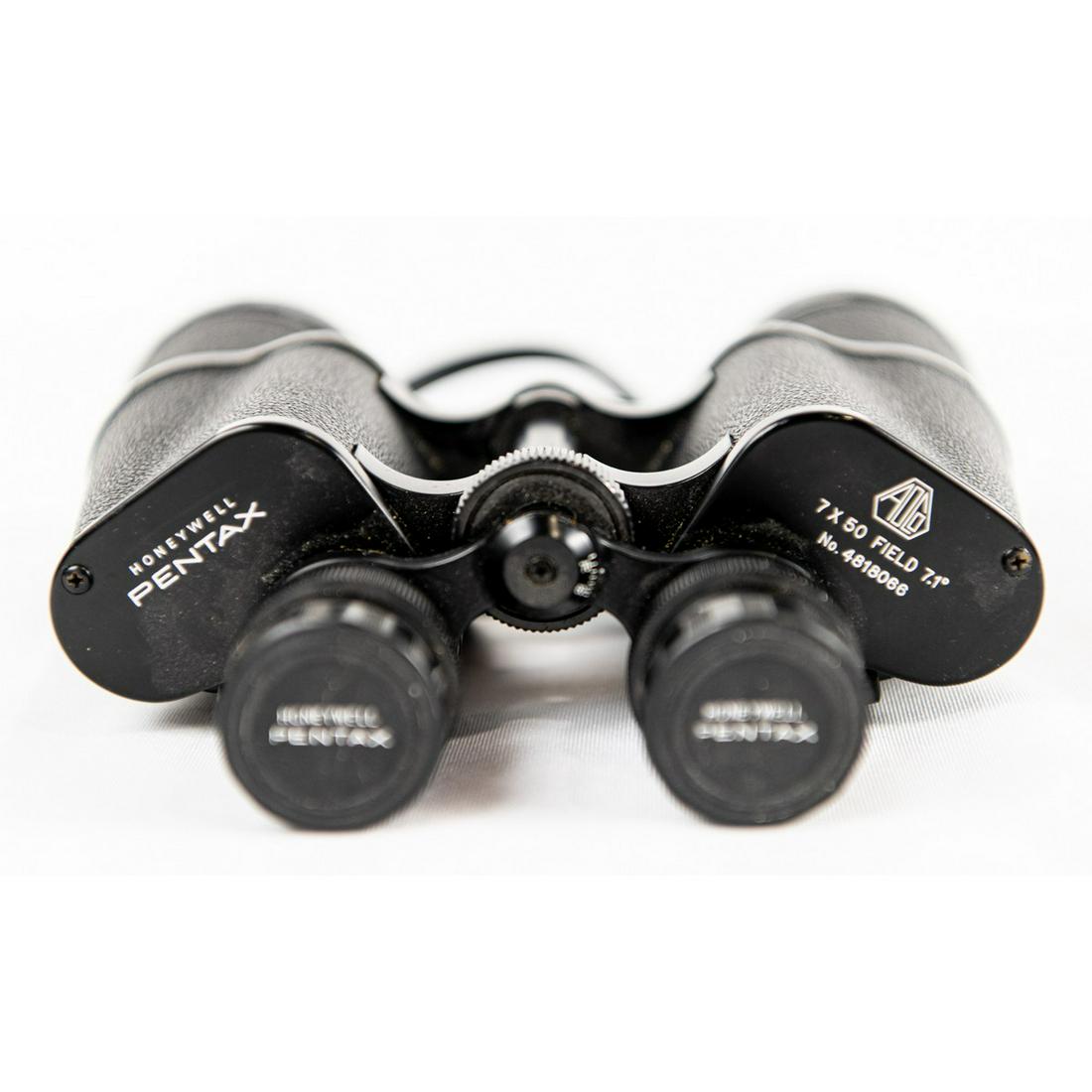 Honeywell PENTAX 7X50 Binoculars: 7.1 degree. Good condition with lens caps and neck strap (no case).