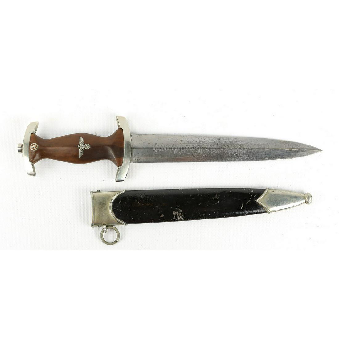 WWII German NSKK Dagger: Number 8 on the McSARR Rarity List, 10 is the rarest. Maker is R. Haastert & Bull Solingen. Blade is in good condition with some pitting and no nicks in edge. Scabbard has some finish loss. Scabbard b