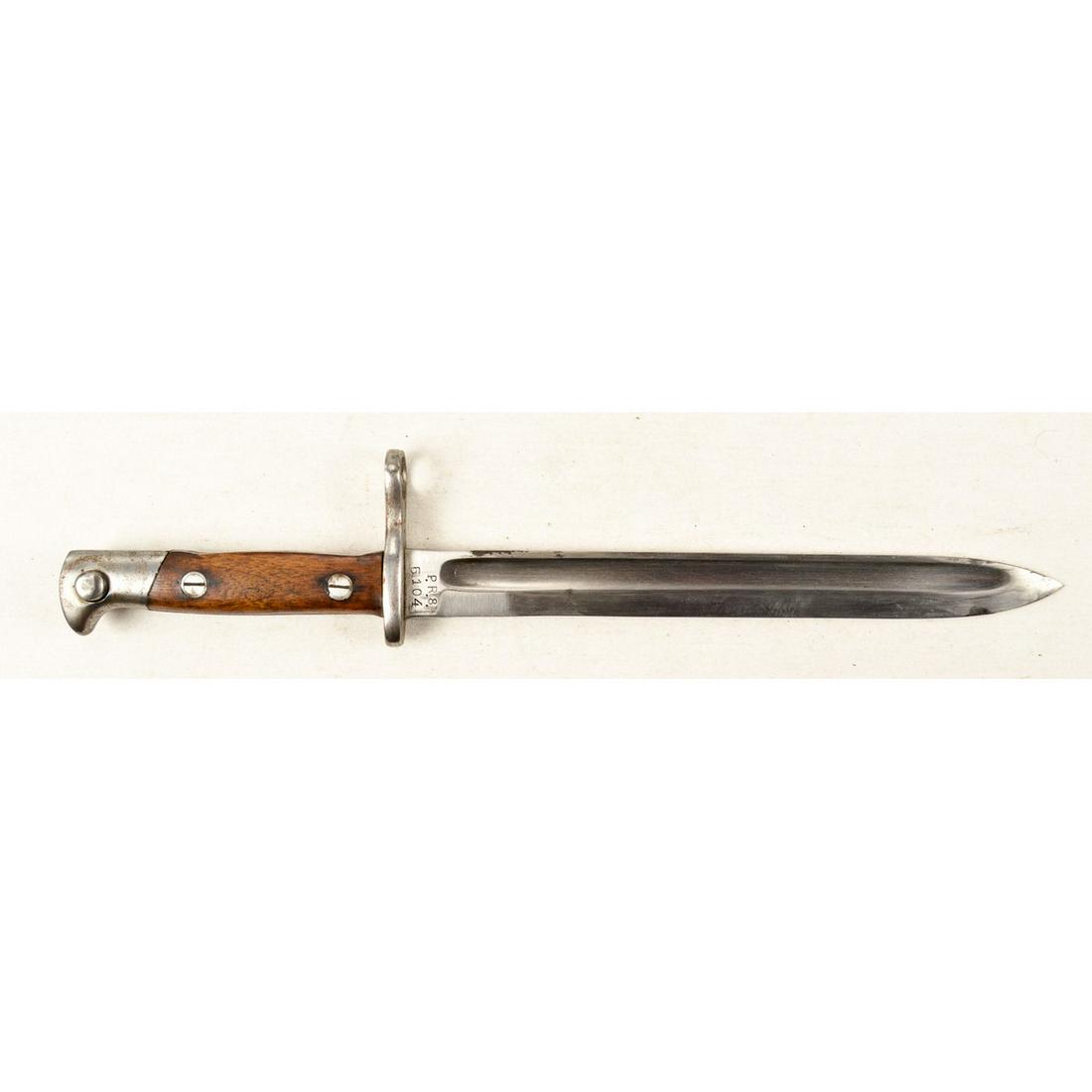 Spanish Mauser Bayonet: A bayonet for a Spanish Mauser rifle. Bayonet ricasso is marked "P.R.8./5104" on one side and other side is blank. 9.875" bright blade is in very good condition with minor oxidation on blade and sharp