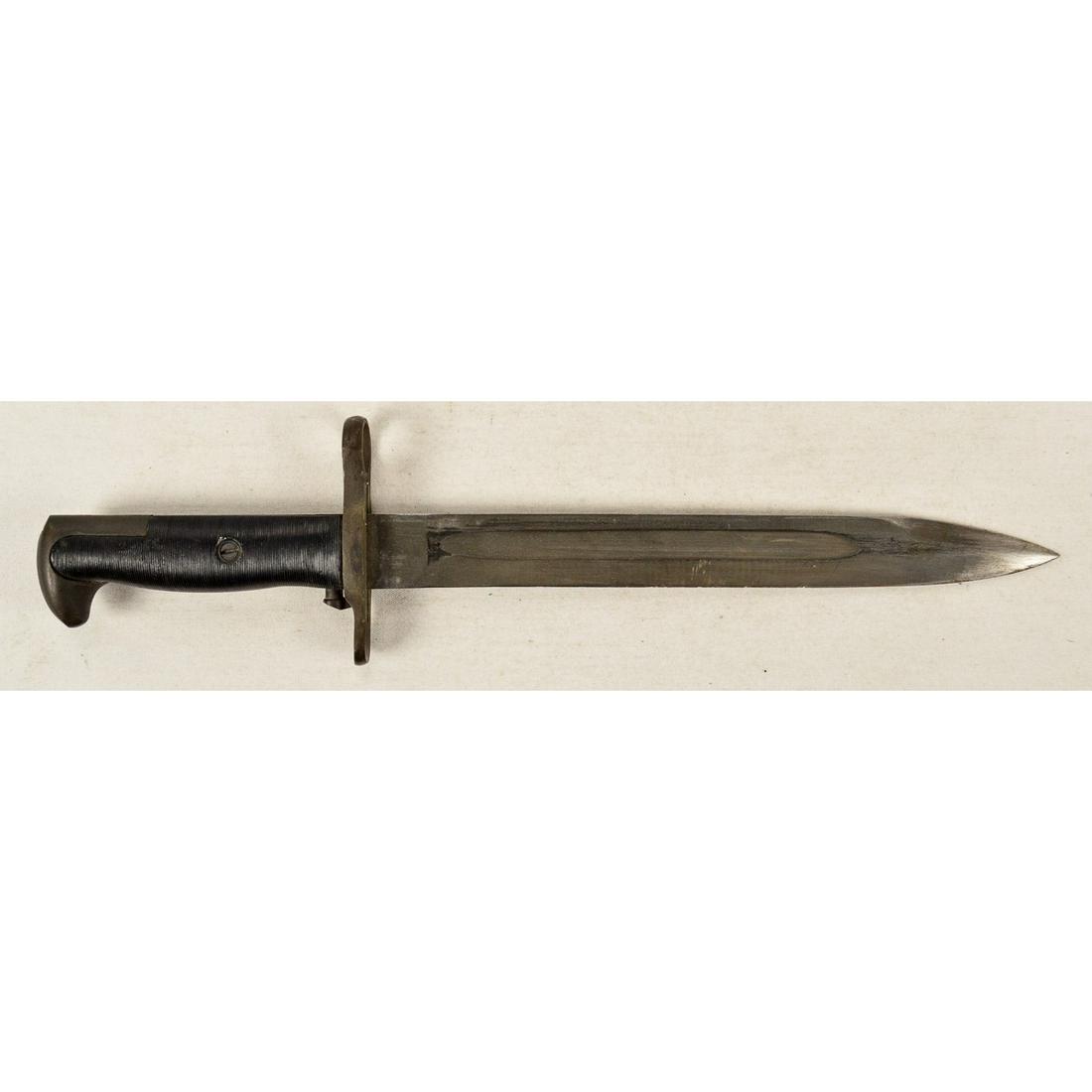 WWII US AFH M1 Bayonet: A WWII US M1 bayonet made by American Fork and Hoe (AFH). Bayonet blade has some minor nicks in blade edge and tip is sharp and pointy. Parkerized finish is in overall good condition with some wear fr