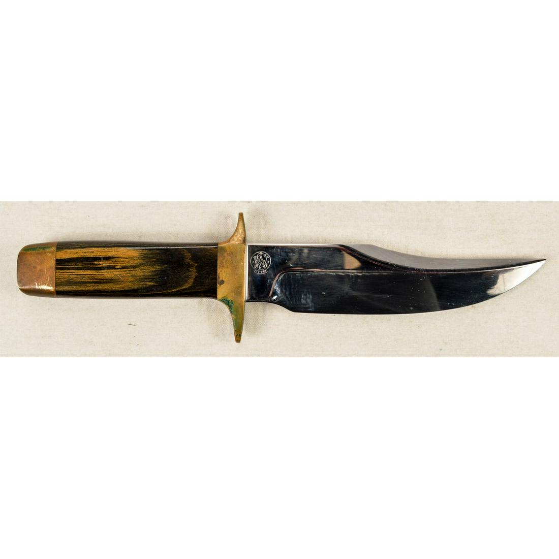 Smith & Wesson 11478 Hunting Knife: 6" stainless fixed blade hunting knife made by Smith & Wesson. Ricasso is marked with S&W logo on one side and "Made in U.S.A./11478" on other side. Spine marked "Smith & Wesson". Blade is in very goo