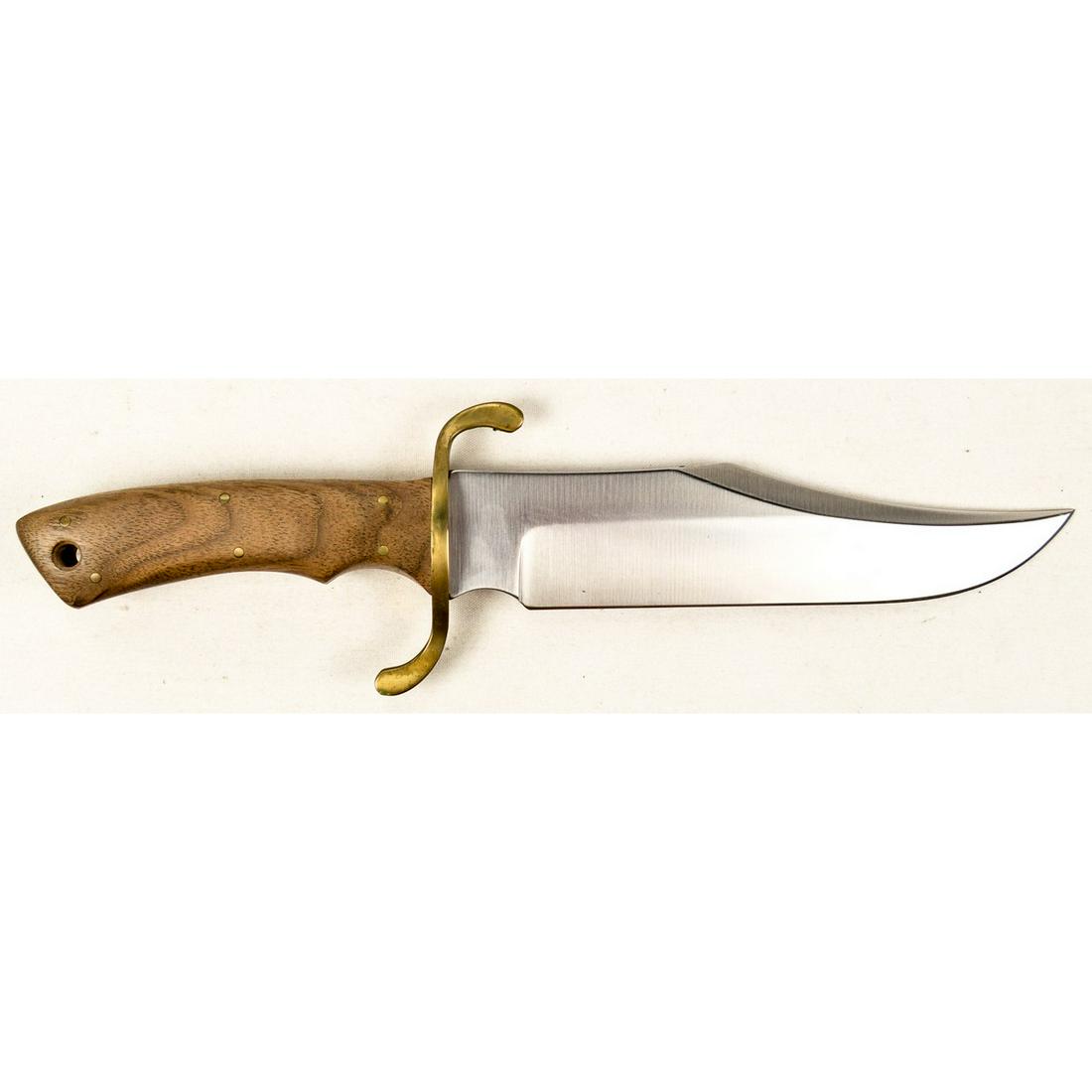 Older Boker Fixed Blade Knife: This is an older Boker Fixed Blade Knife. The blade is in very good condition, there are some blemishes in the brass on finger guard. Unique finger guard. Handle contains a Boker tree logo and says 'B