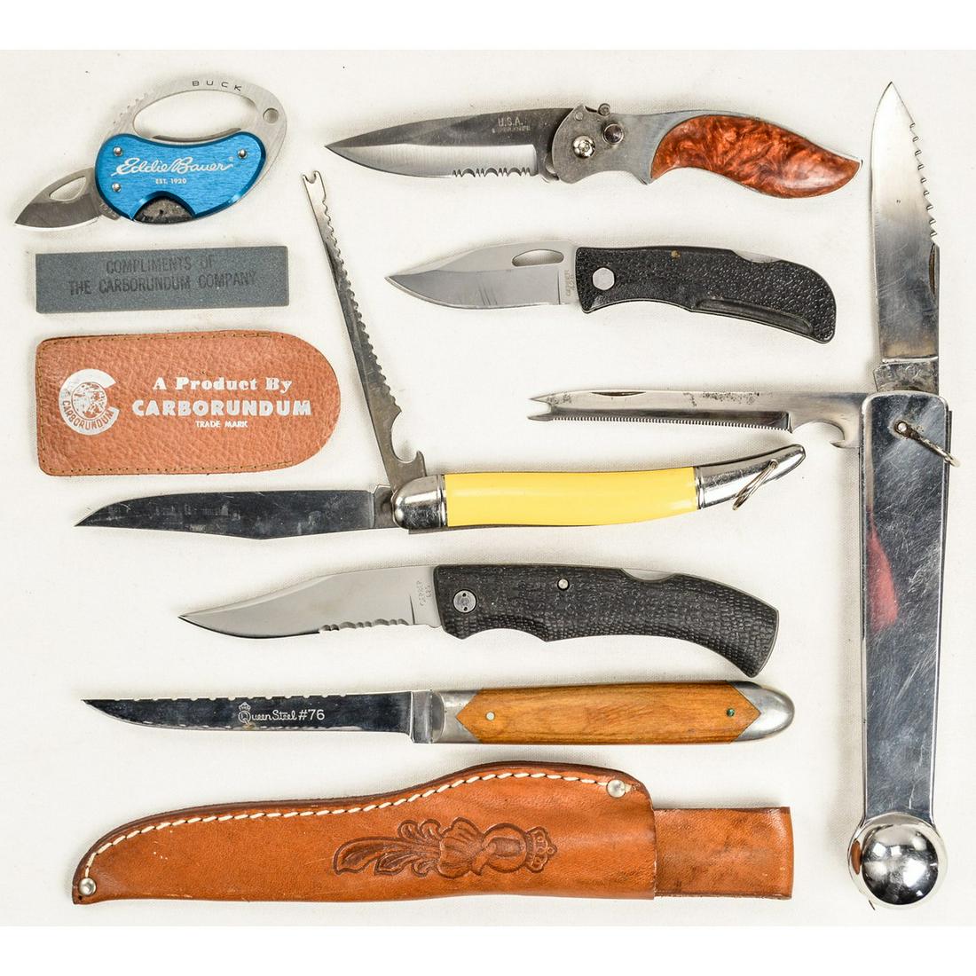 Lot of 7 Field & Fishing Knives: Lot contains 1 Queensteel #76 knife, a fishing knife with tape measure, a Gerber 625 knife of Portland, OR, an Eddie Bauer "Buck" knife, a spring loaded "USA Superknife" with belt clip, a "Saber" Irel
