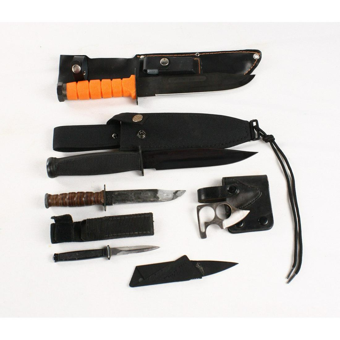 Lot of Fixed Blade Knives: There is a baby boot knife by Fury the blade is 2.75" long. Overall the knife measures 6". It is in used conditionThere is a mini replica of a KBAR USMC fighting knife in used condition. It measures 7