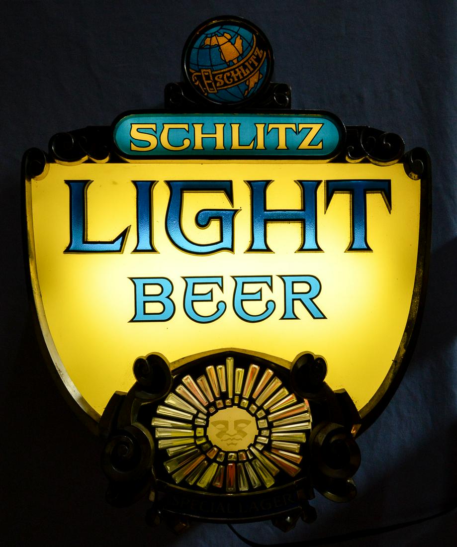 Schlitz Beer Light Up Sign: Single sided light up sign for Schlitz beer. Sign still lights up and is in very good used condition. Measures 21.5"T x 17"W.