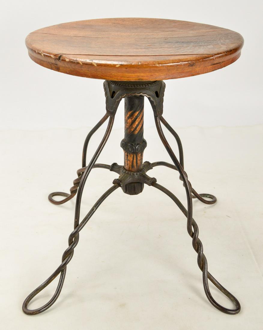 Classic Round Wood Seat 4-Leg Piano Stool: Wood piano stool with metal ice cream parlor style legs, seat is fixed in place, good condition. See photos
