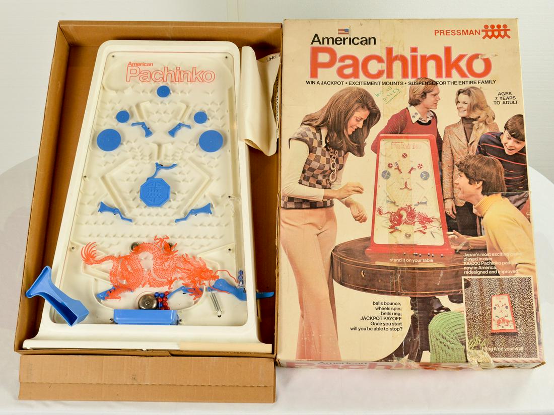 Vintage American Pachinko Table Game: A vintage American Pachinko game by Pressman. Comes in box with instructions. Glass has some scratches and box lid has been taped. See photos.